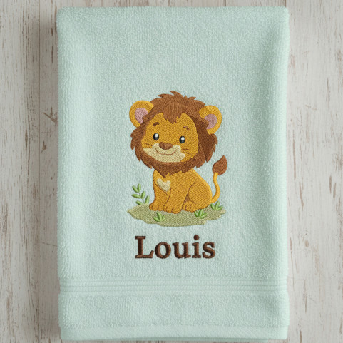 serviette de bain vert pale motif lion brodé