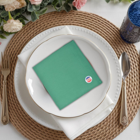 broderie sur serviette de table verte